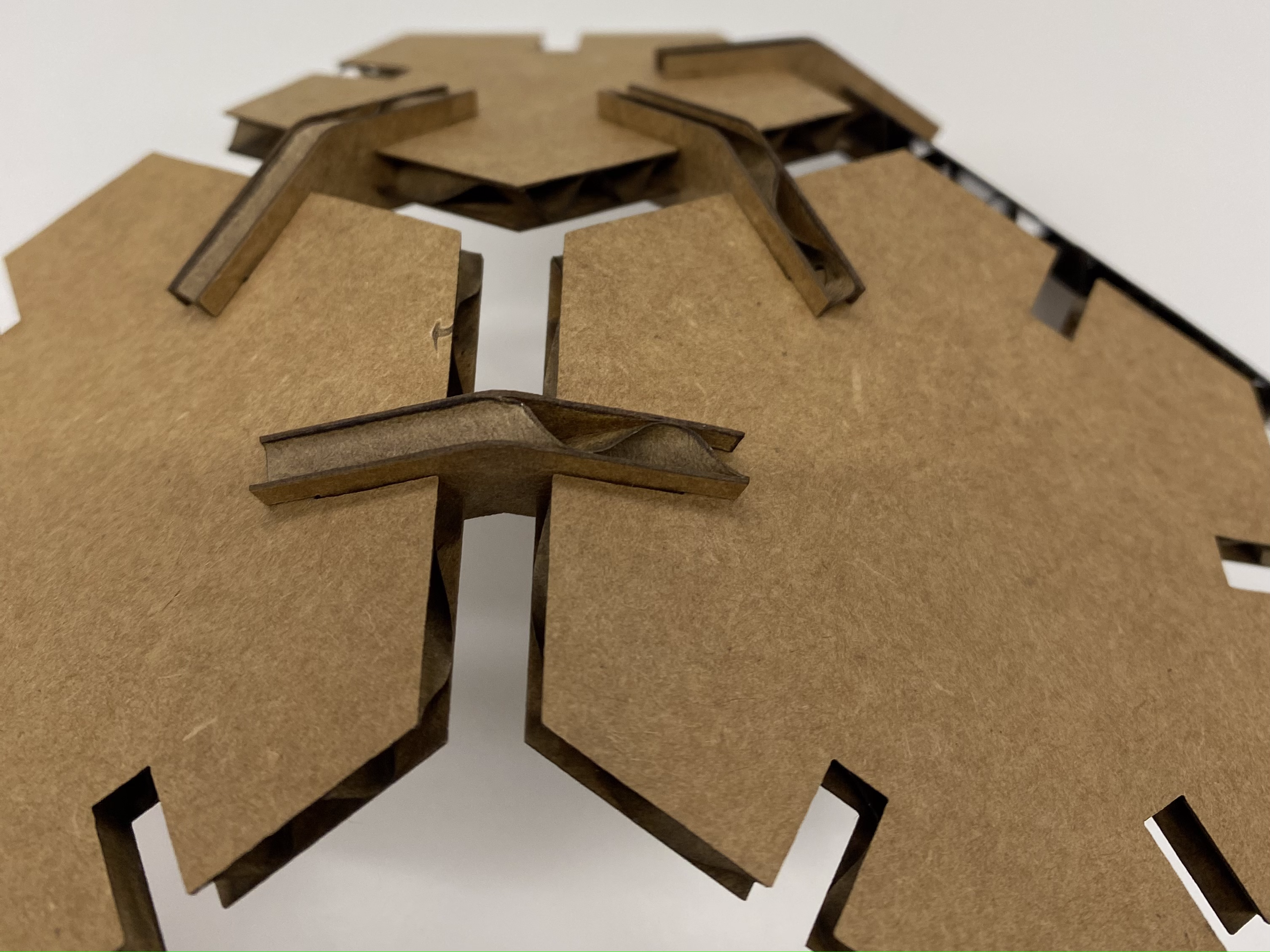 process photo of making the press-fit football