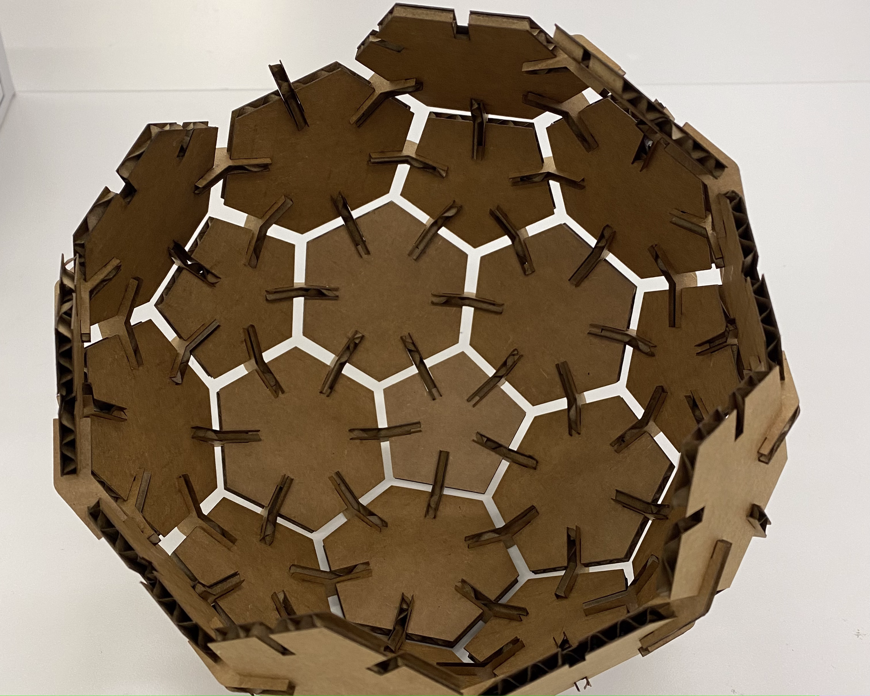 process photo of making the press-fit football