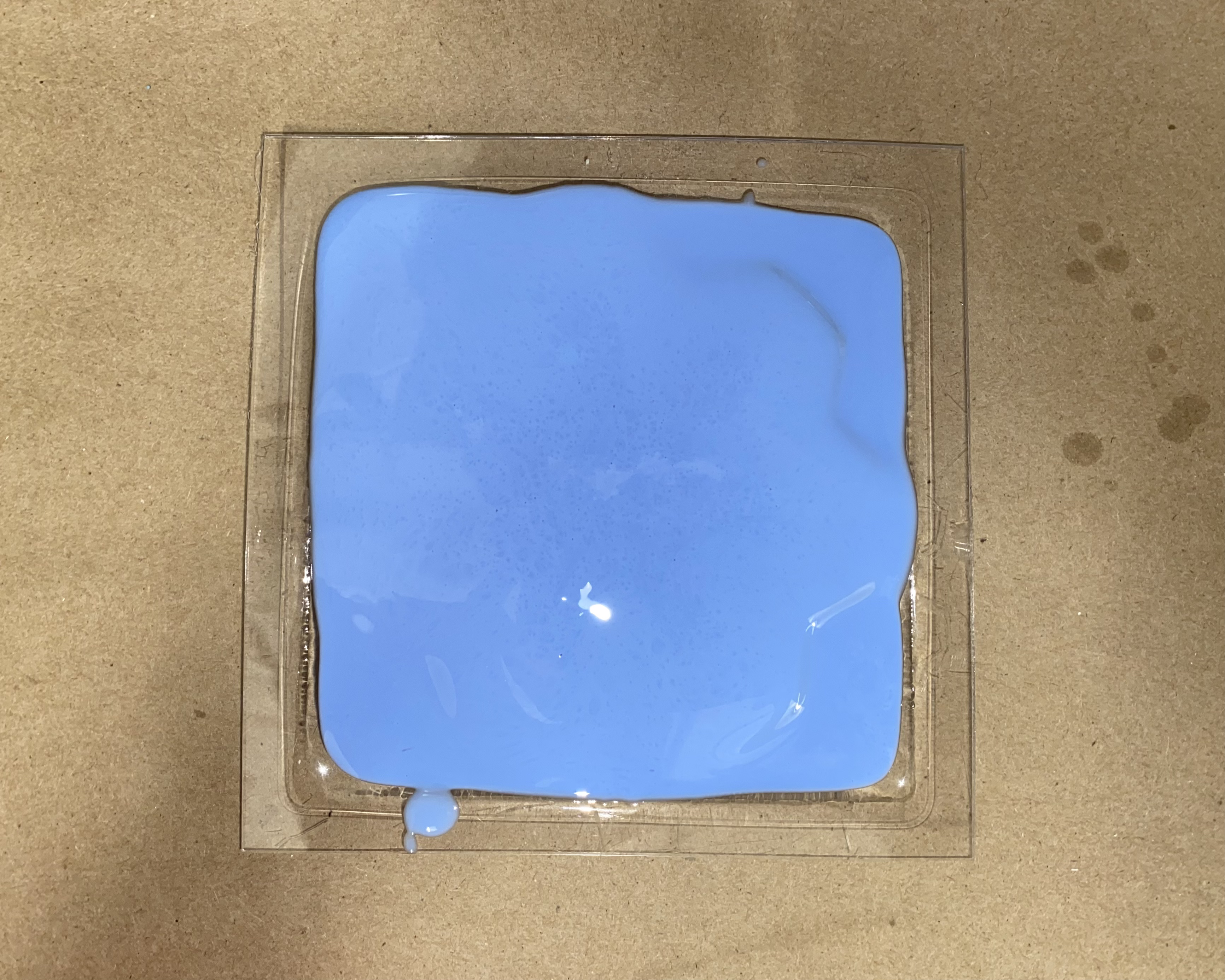 mold filled with blue silicone rubber
